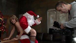 Teenage blonde girl Kitty Cat is seduced to have sex by fellow in uniform of Santa. She is staying in black fishnet stockings before getting fat rod inside of mouth and cunt.